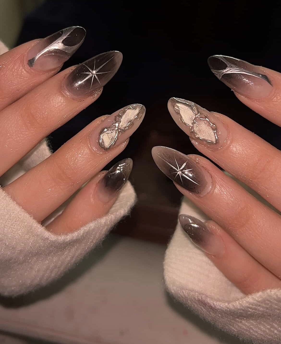 Smoky almond nails with star details